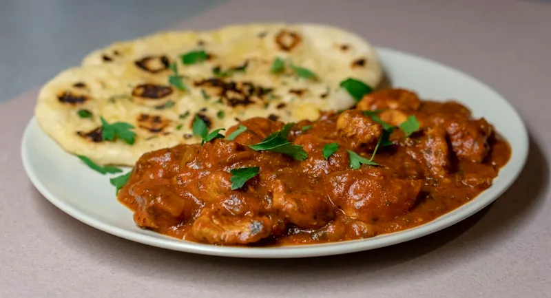 Slow-cooked North Indian lamb curry with fresh coriander
