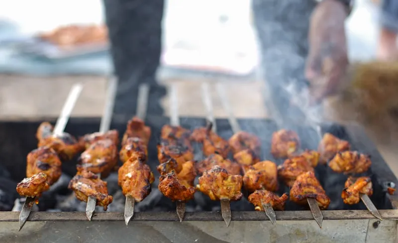 Char-grilled tandoori chicken skewers from the clay oven